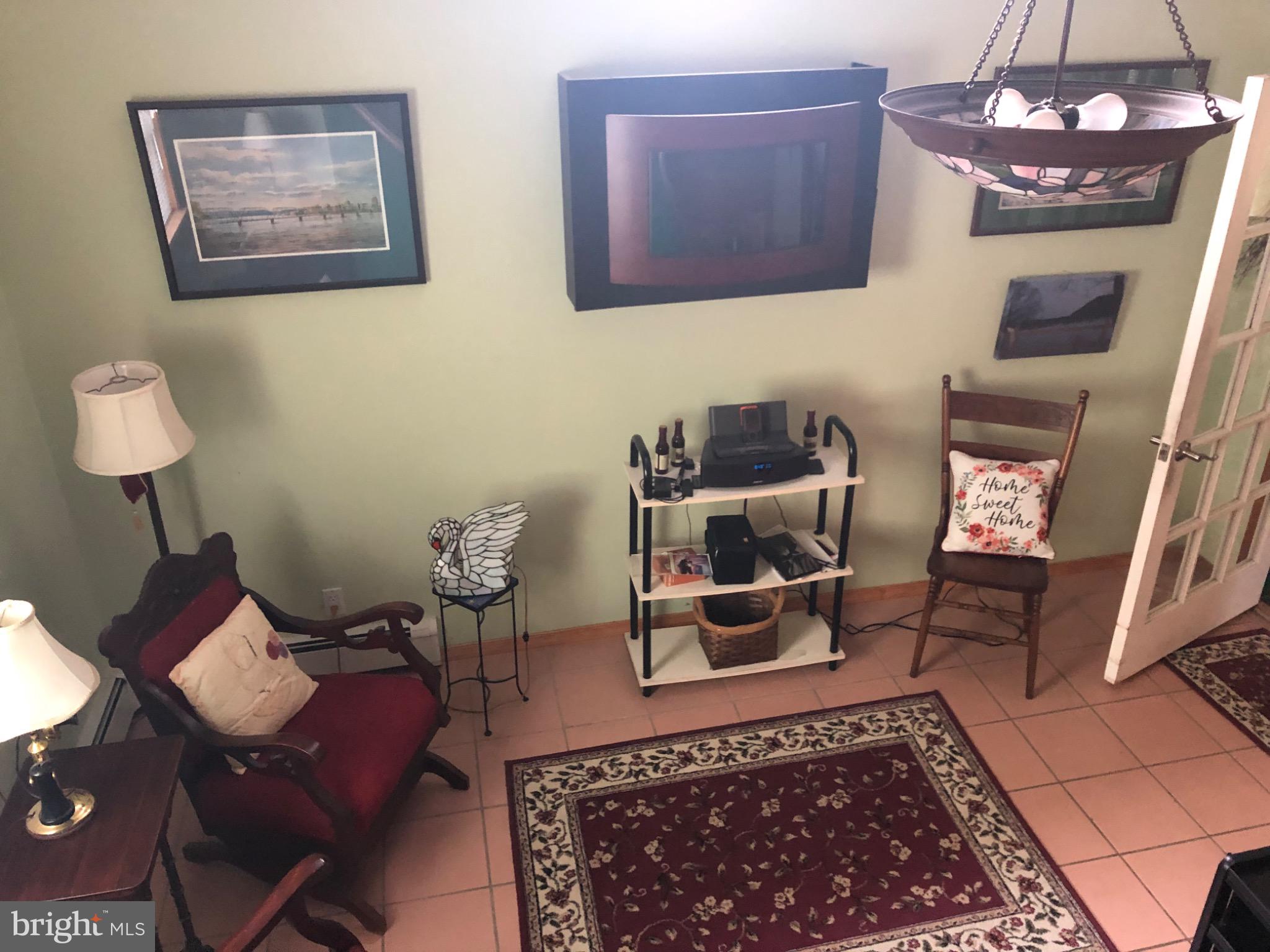 320 Cameron Street Marysville, PA 17053 - Photo 7 of 15 a living room with furniture and a rug
