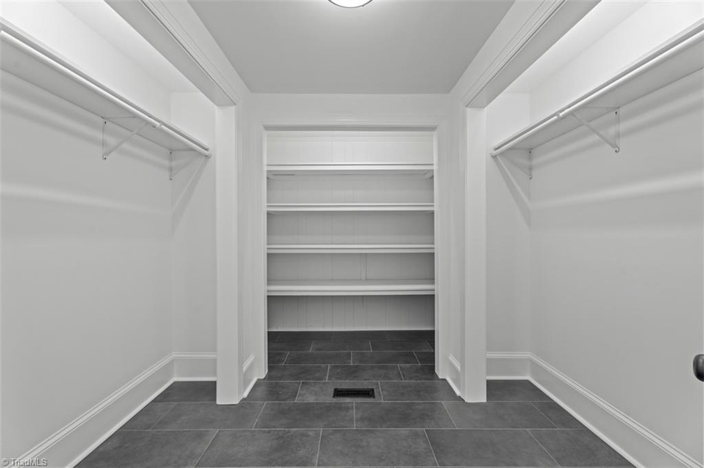 632 Stokesburg Road Walnut Cove, NC 27052 - Photo 30 of 40 Primary Walk In Closet Off Primary Bath