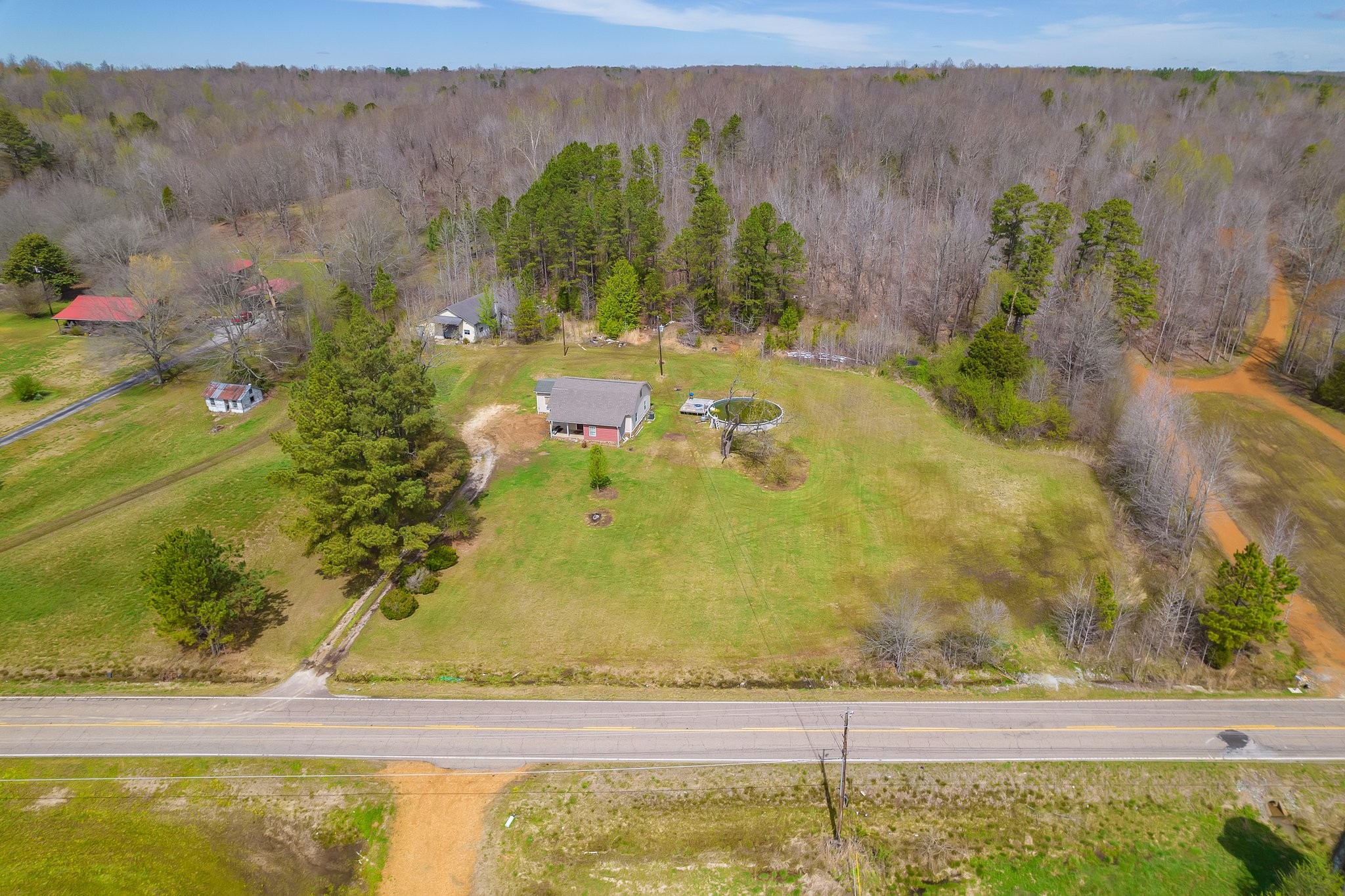 3249 Beech Bluff Road Jackson, TN 38301 - Photo 28 of 29 a view of a swimming pool and a yard