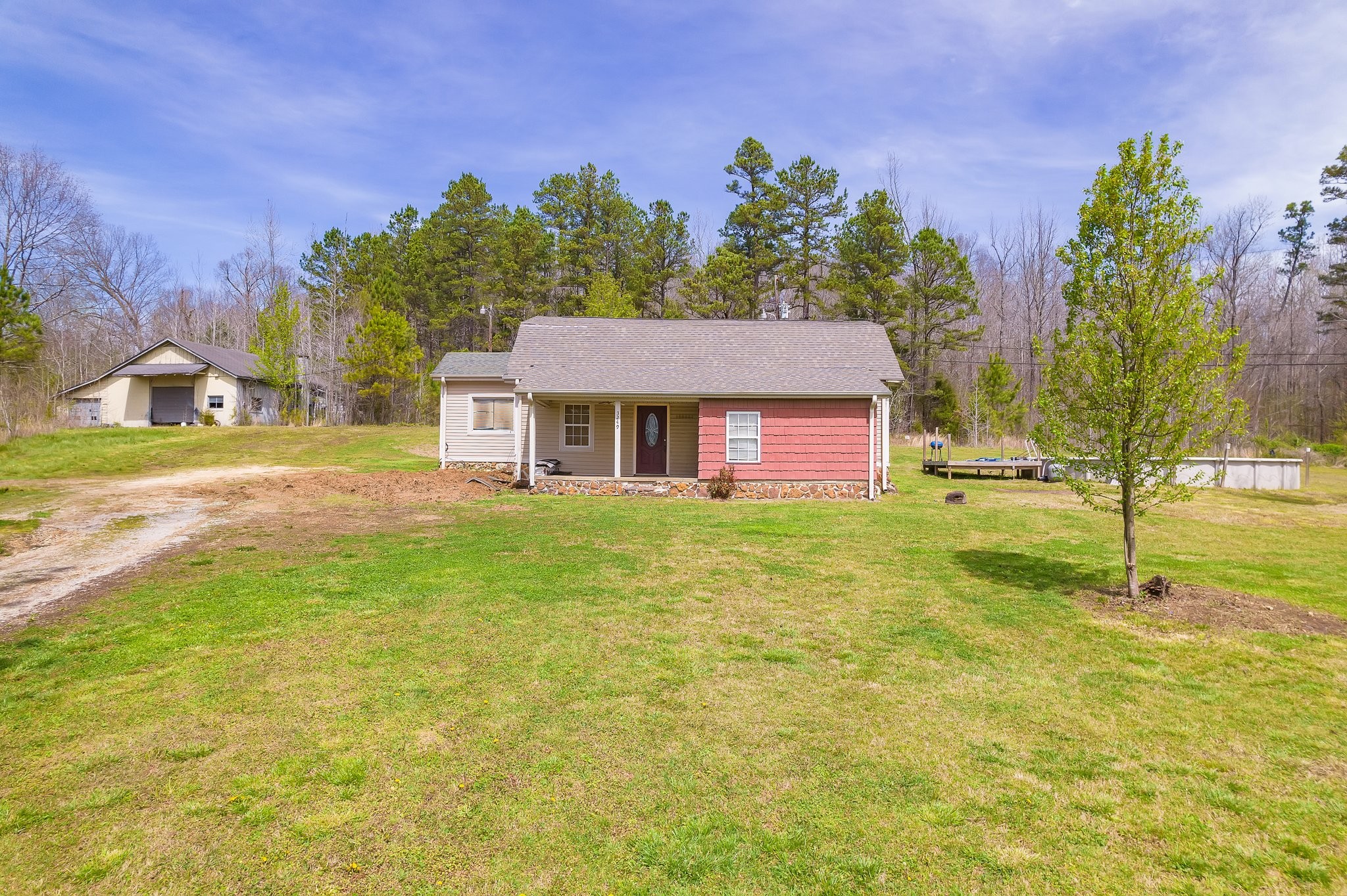 3249 Beech Bluff Road Jackson, TN 38301 - Photo 3 of 29 a front view of house with yard and trees
