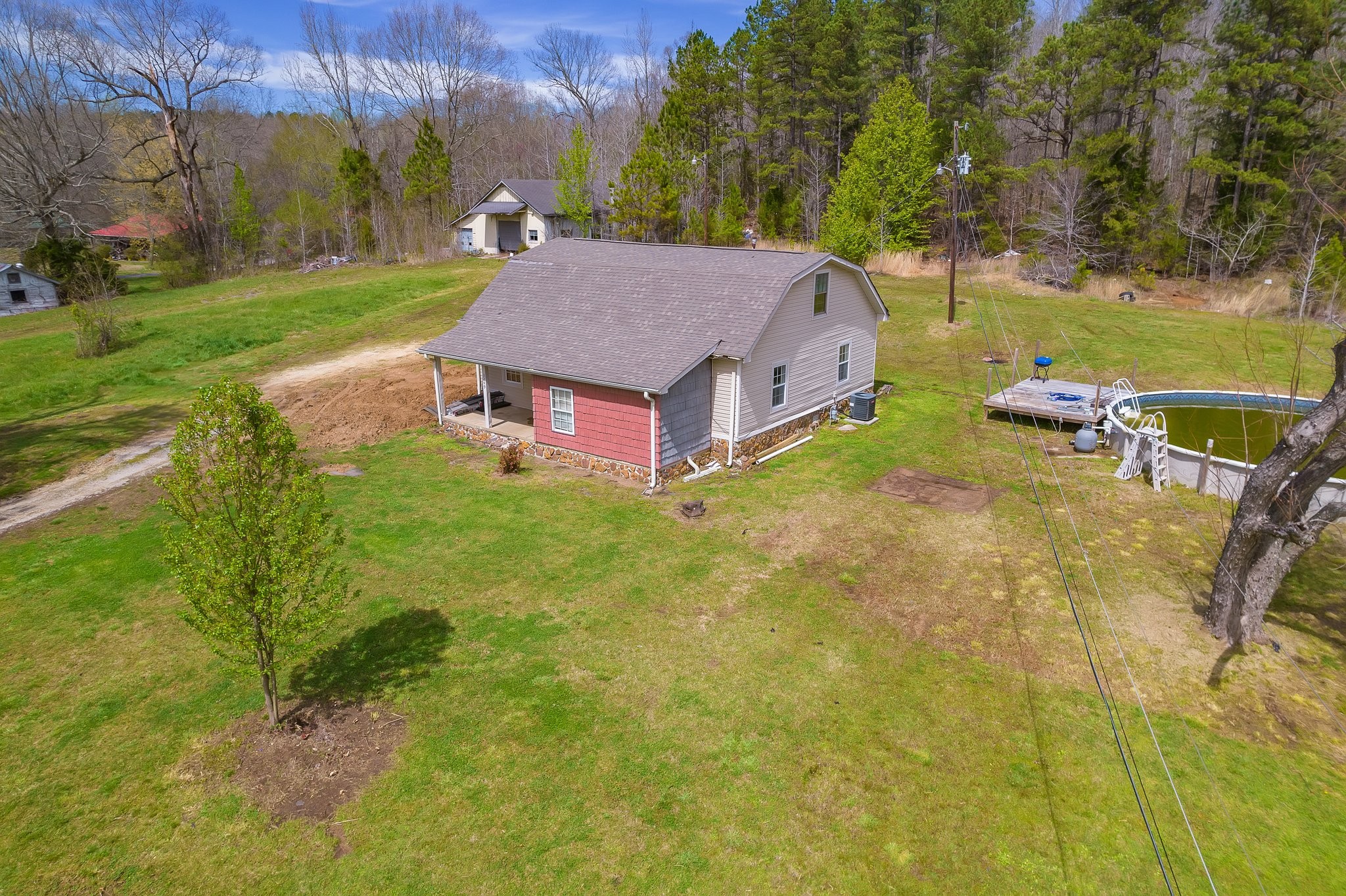 3249 Beech Bluff Road Jackson, TN 38301 - Photo 4 of 29 a backyard of a house with table and chairs
