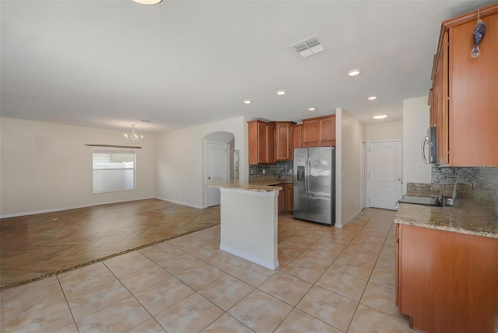 1902 Hawks View Drive Ruskin, FL 33570 - Photo 12 of 41 a kitchen with a refrigerator and a sink