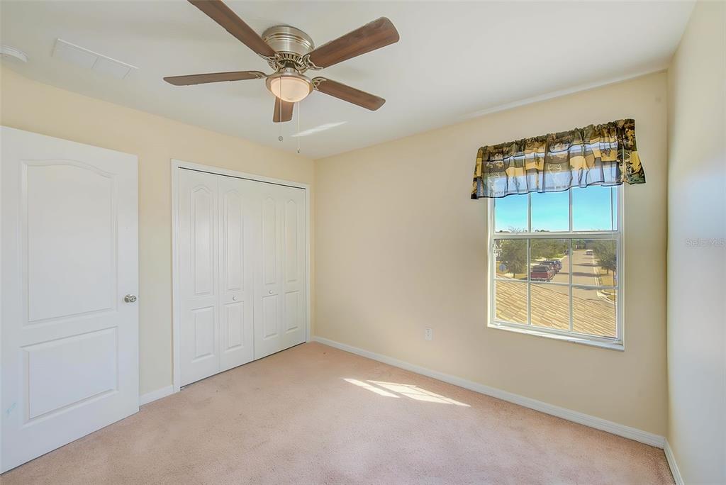 1902 Hawks View Drive Ruskin, FL 33570 - Photo 24 of 41 a view of an empty room with a window