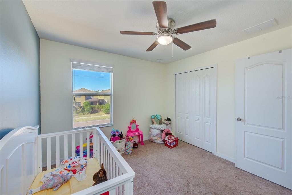 1902 Hawks View Drive Ruskin, FL 33570 - Photo 28 of 41 a living room with furniture
