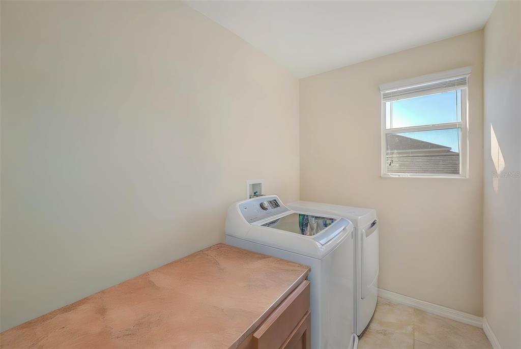 1902 Hawks View Drive Ruskin, FL 33570 - Photo 29 of 41 a utility room with dryer and washer