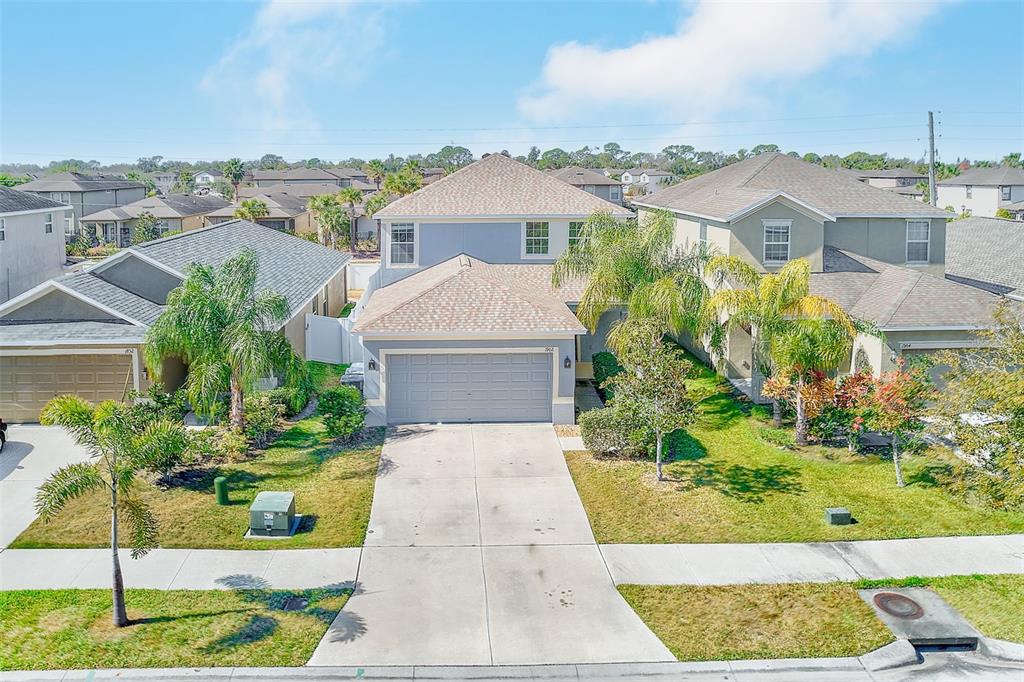 1902 Hawks View Drive Ruskin, FL 33570 - Photo 30 of 41 a front view of a house with a garden