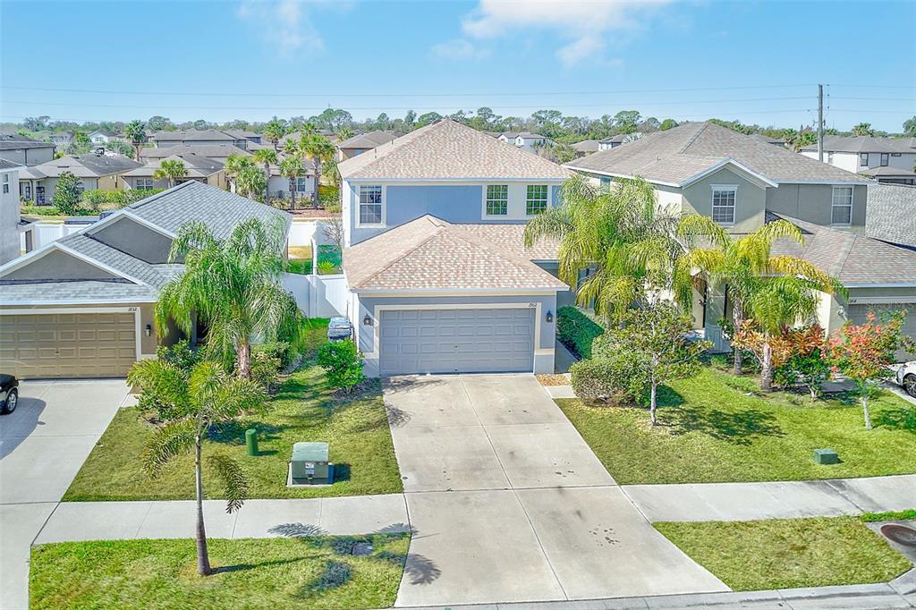 1902 Hawks View Drive Ruskin, FL 33570 - Photo 31 of 41 a front view of a house with a garden