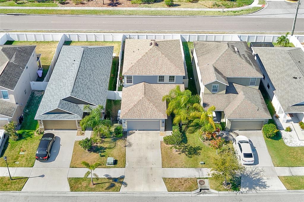 1902 Hawks View Drive Ruskin, FL 33570 - Photo 33 of 41 an aerial view of a house with a yard and potted plants