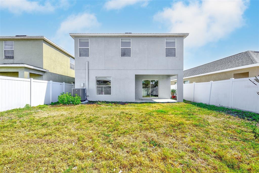 1902 Hawks View Drive Ruskin, FL 33570 - Photo 37 of 41 a house view with a backyard space