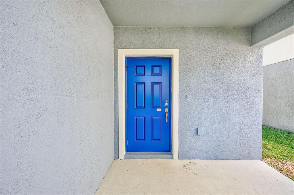 1902 Hawks View Drive Ruskin, FL 33570 - Photo 4 of 41 a view of a hallway with wooden floor