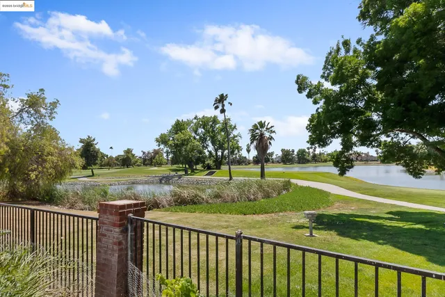 a view of a balcony and lake