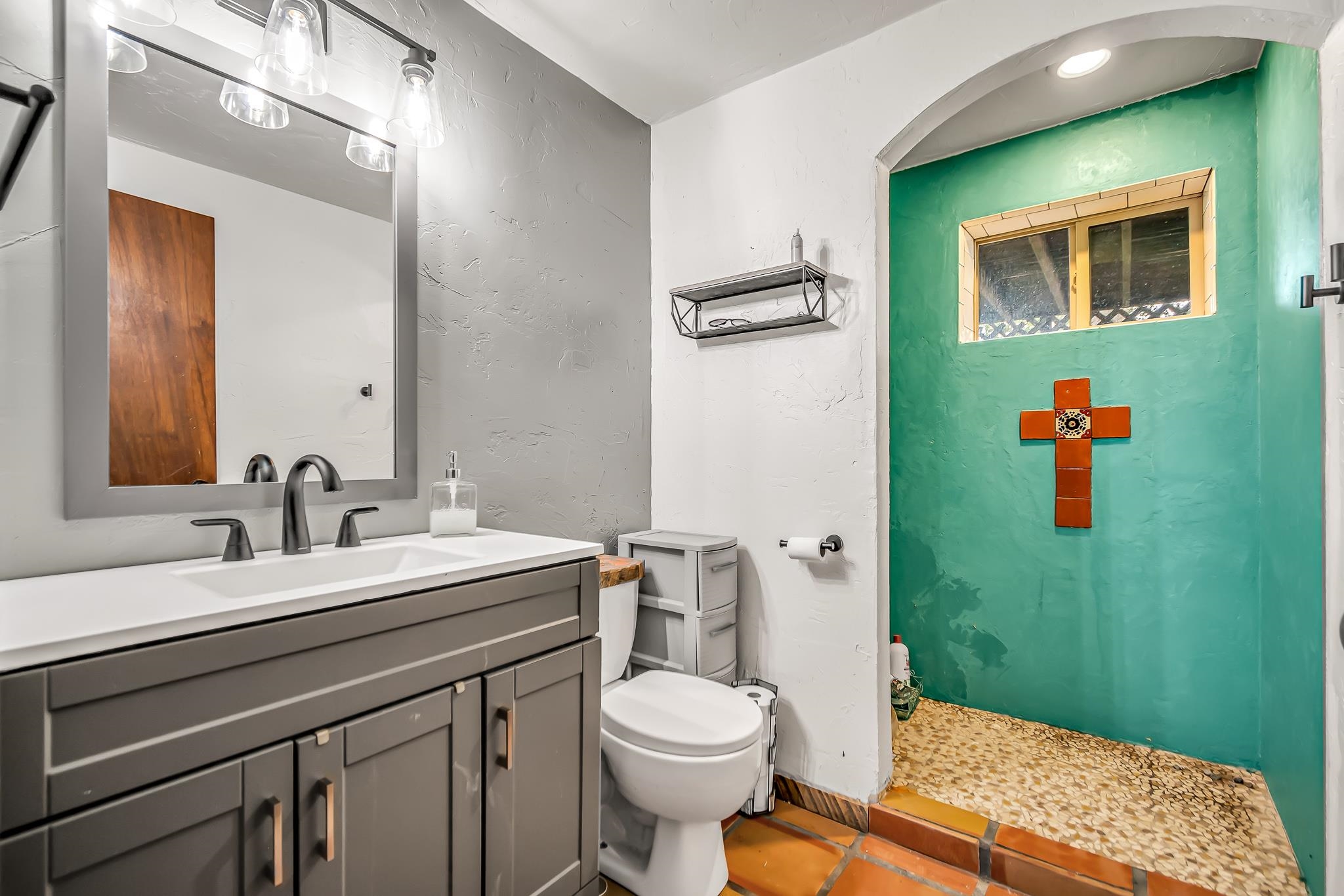 1574 P Road Loma, CO 81524 - Photo 22 of 34 a bathroom with a sink a toilet and shower