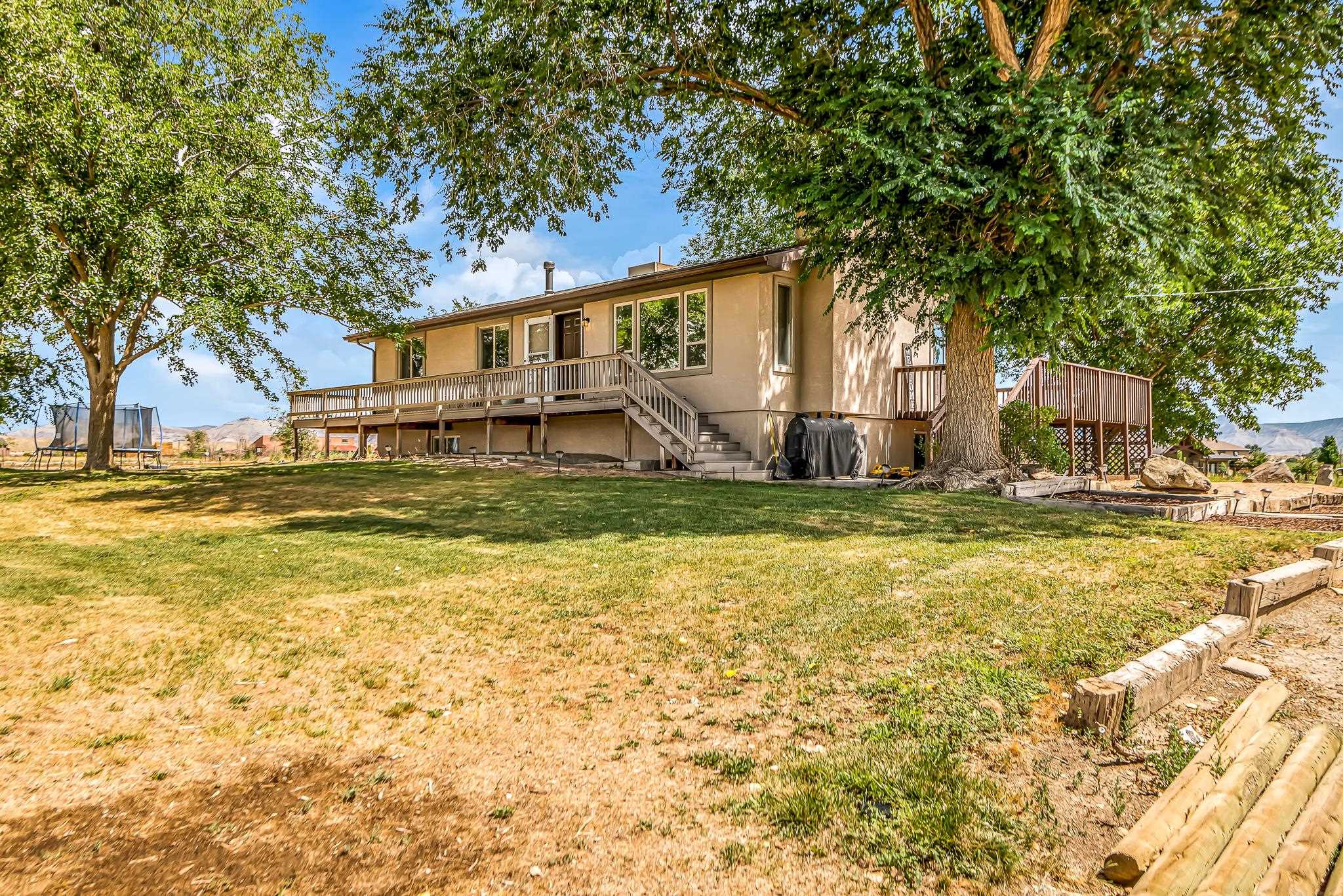 1574 P Road Loma, CO 81524 - Photo 26 of 34 a front view of house with yard