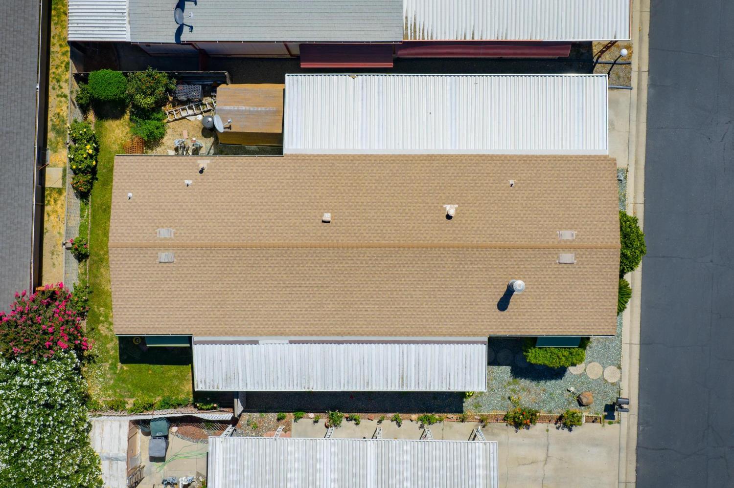 1200 South Carpenter Road, Unit 4 Modesto, CA 95351 - Photo 20 of 22 an aerial view of a house with a yard and sitting area