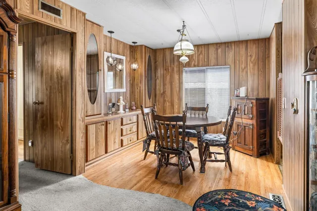 a kitchen with stainless steel appliances granite countertop a stove and a sink