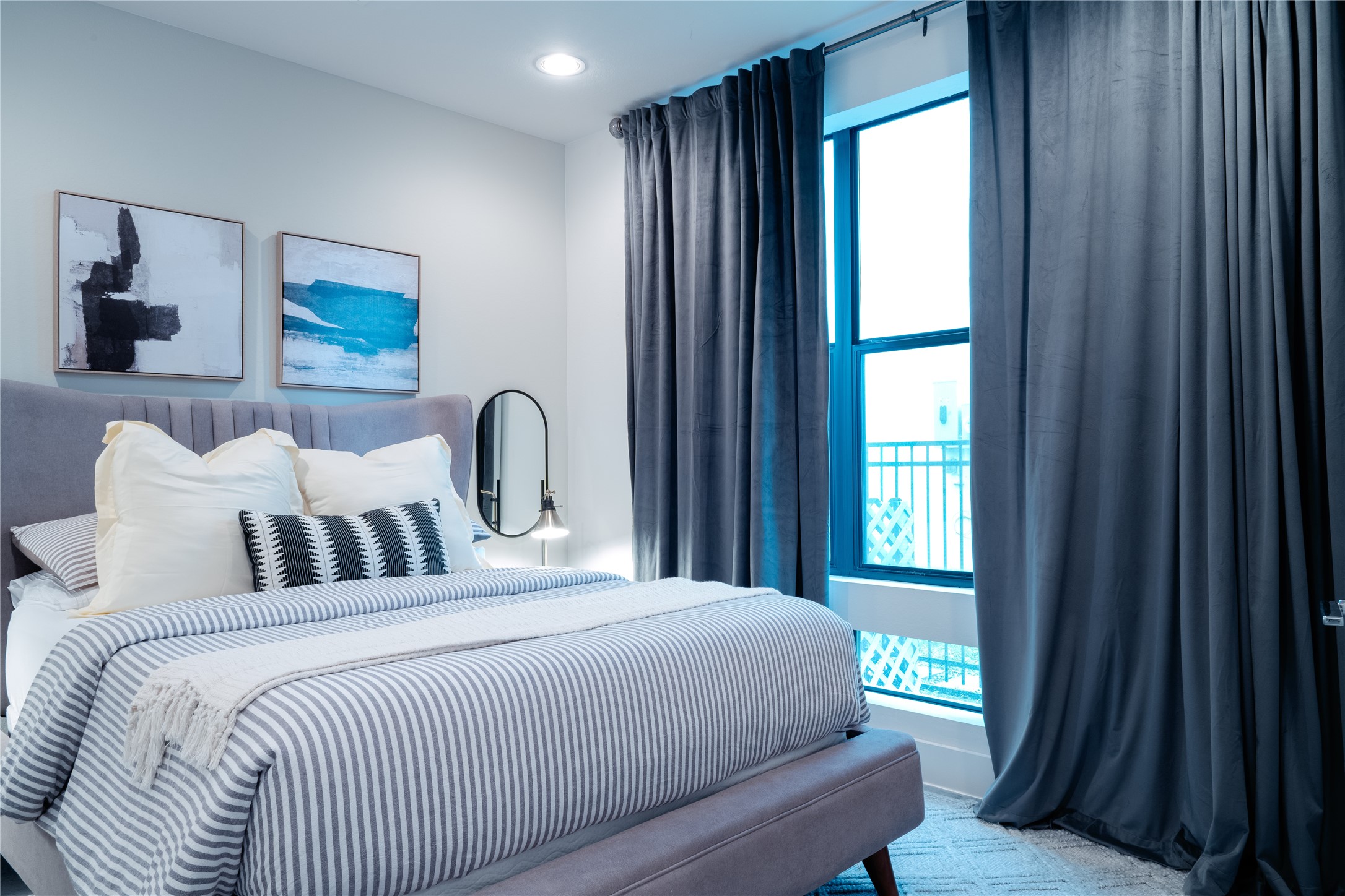 2826 Clay Street Houston, TX 77003 - Photo 16 of 22 a bedroom with bed and a window