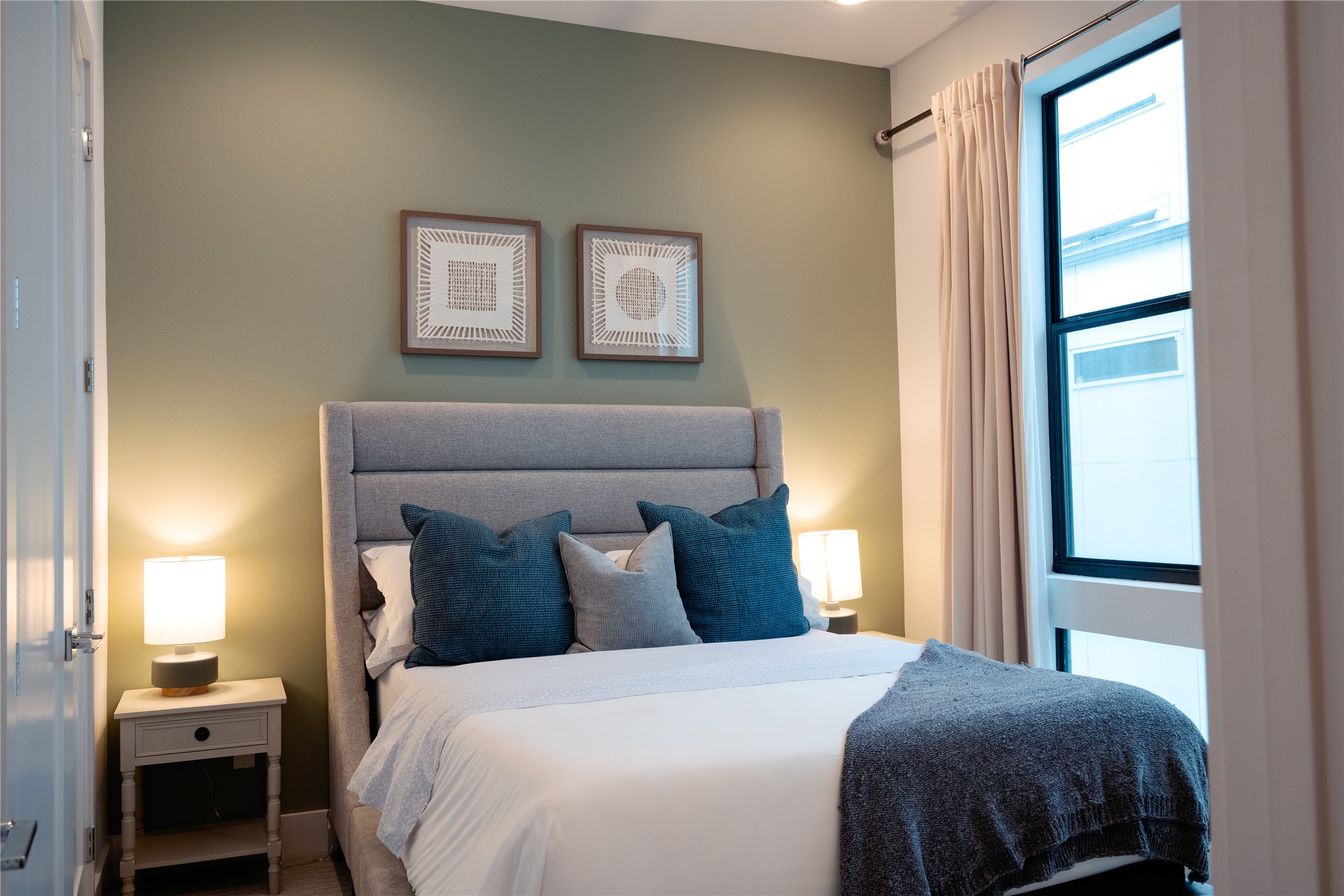 2826 Clay Street Houston, TX 77003 - Photo 19 of 22 a bedroom with a bed and a window