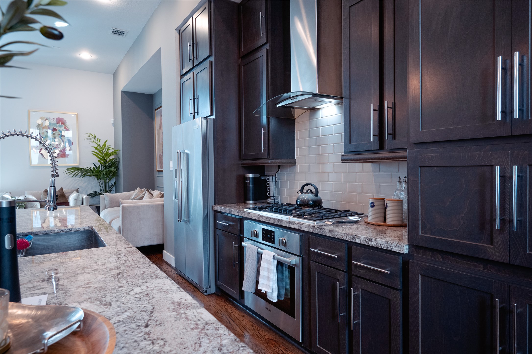 2826 Clay Street Houston, TX 77003 - Photo 2 of 22 a kitchen with stainless steel appliances granite countertop a sink stove and cabinets