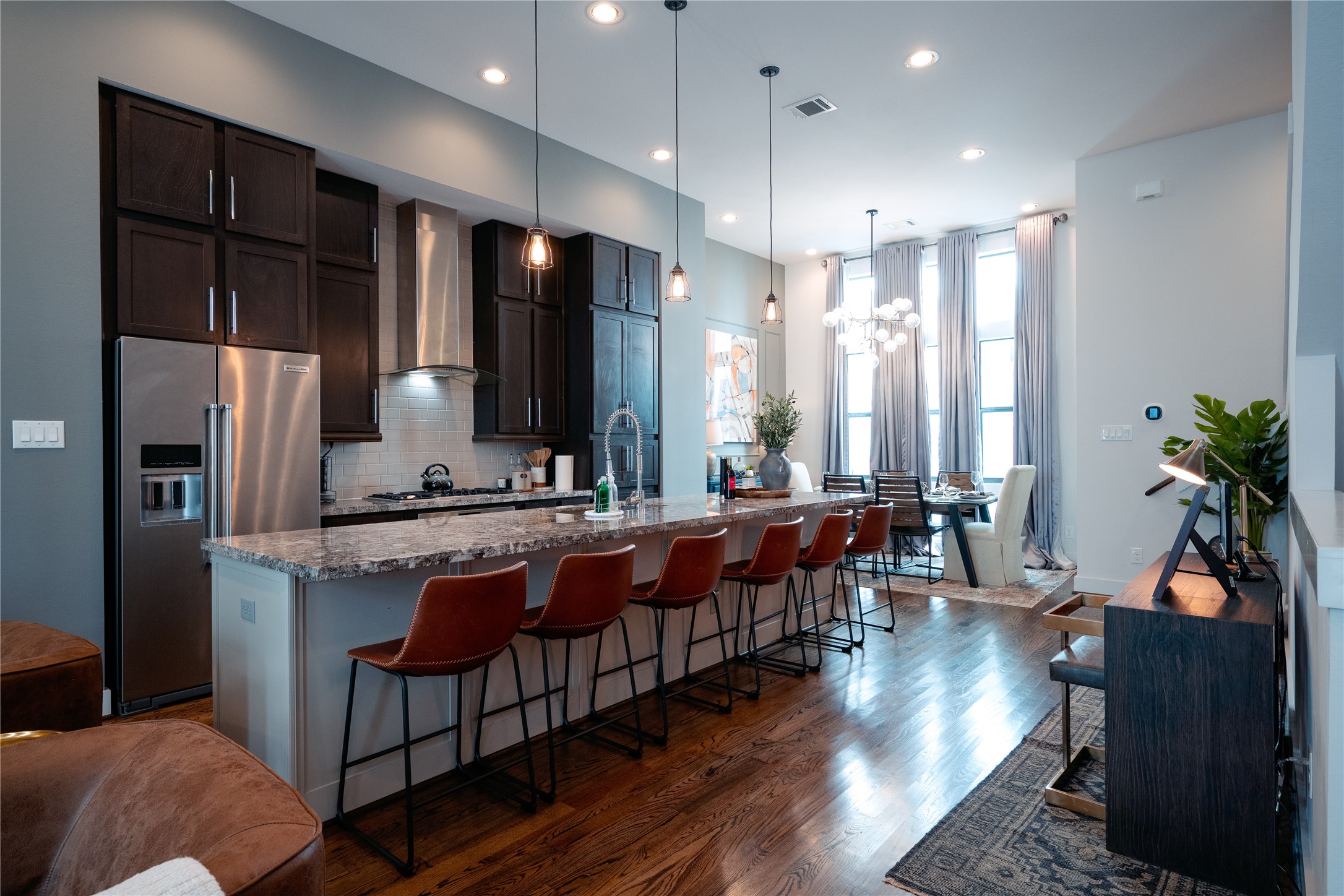 2826 Clay Street Houston, TX 77003 - Photo 4 of 22 a large kitchen with a table and chairs