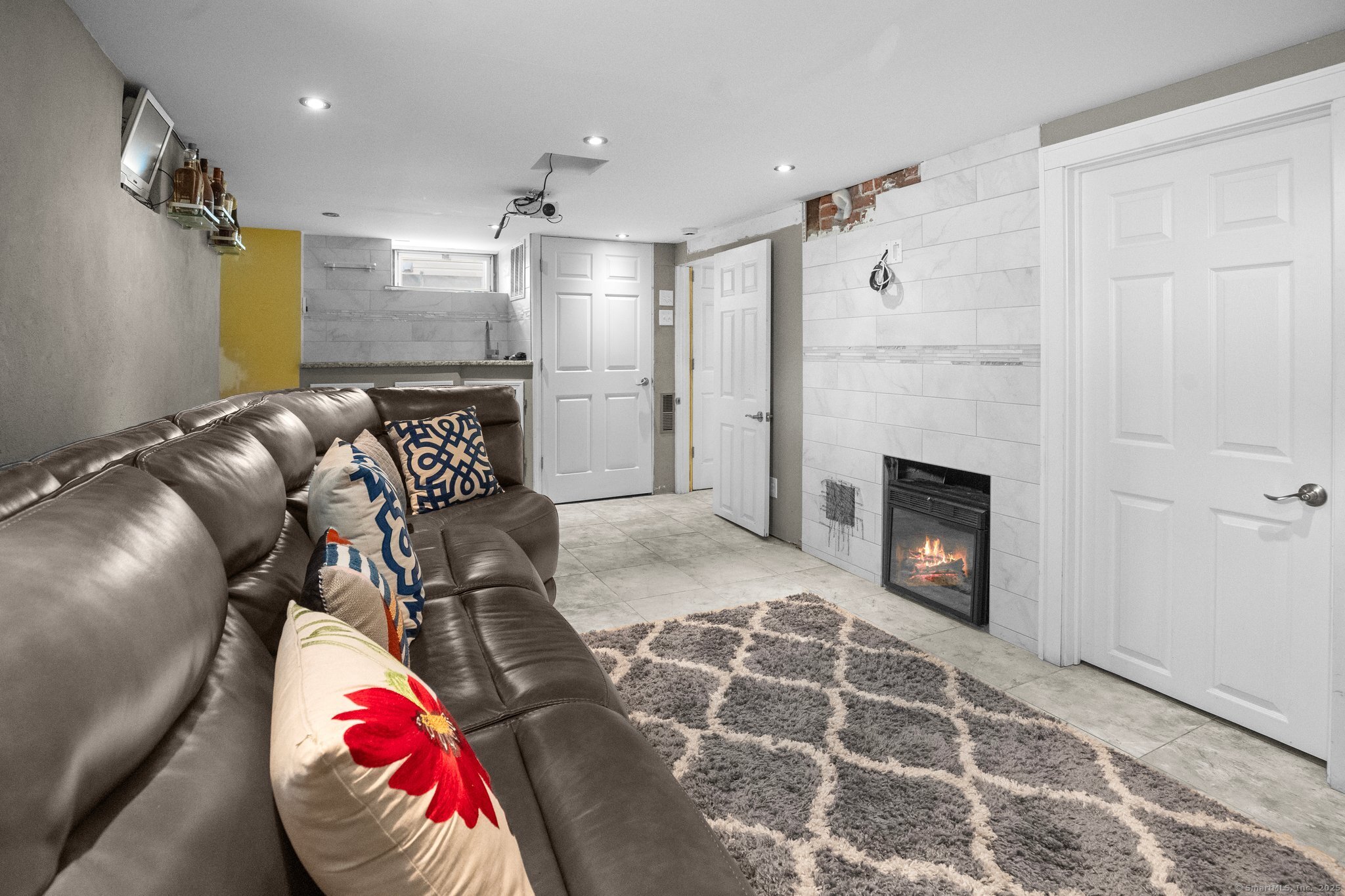 15 Overland Avenue Bridgeport, CT 06606 - Photo 15 of 35 a view of a livingroom with furniture and a fireplace