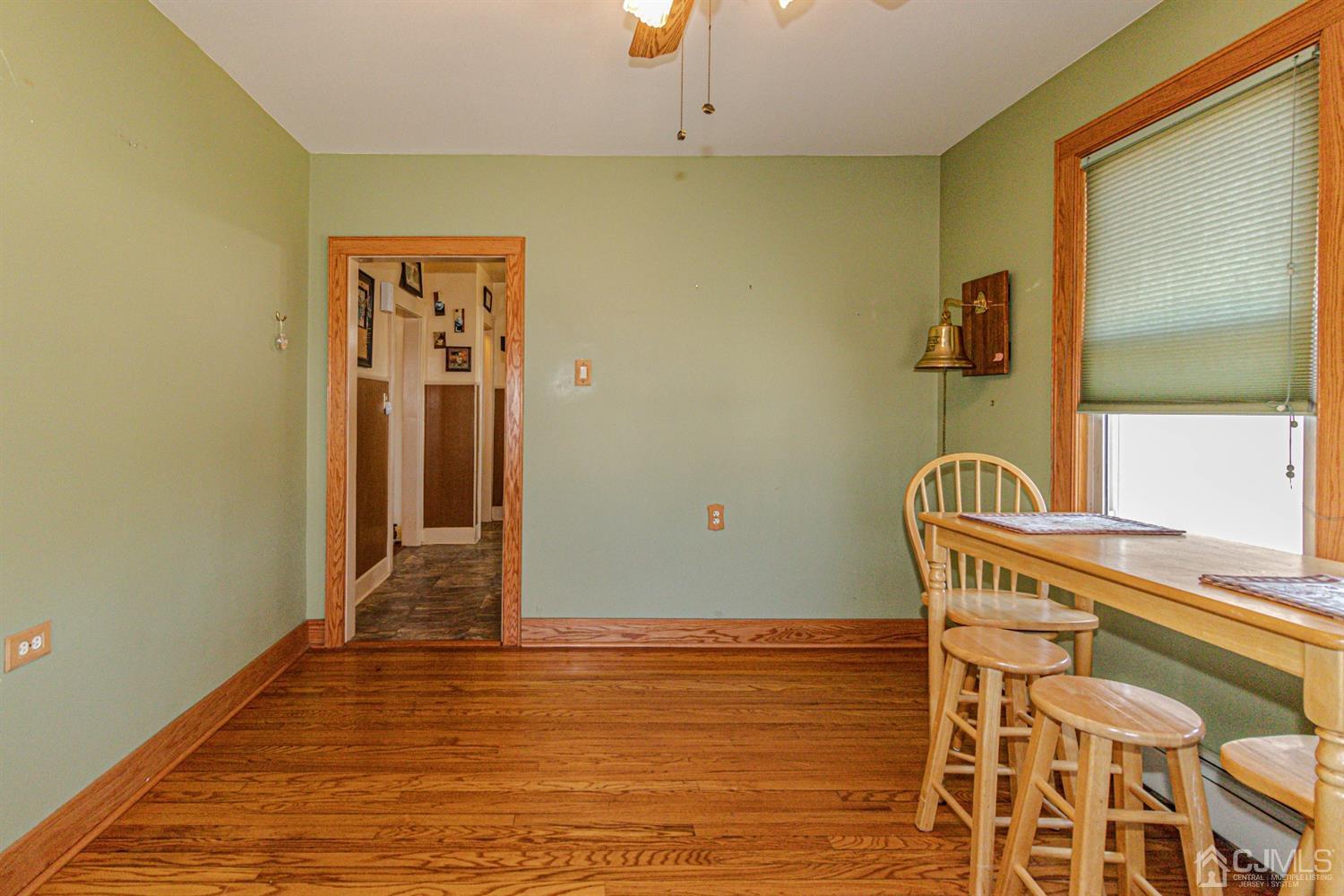 28 Meadow Road Edison, NJ 08817 - Photo 8 of 32 a view of a hallway with wooden floor