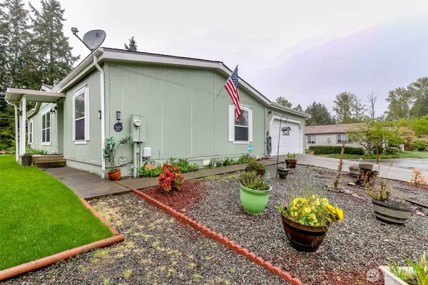 a front view of a house with patio