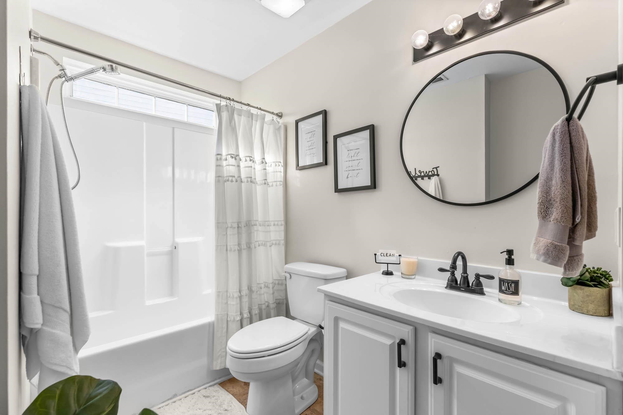 248 McKendree Lane Myrtle Beach, SC 29579 - Photo 12 of 34 Full bathroom with vanity and shower / tub combo with curtain