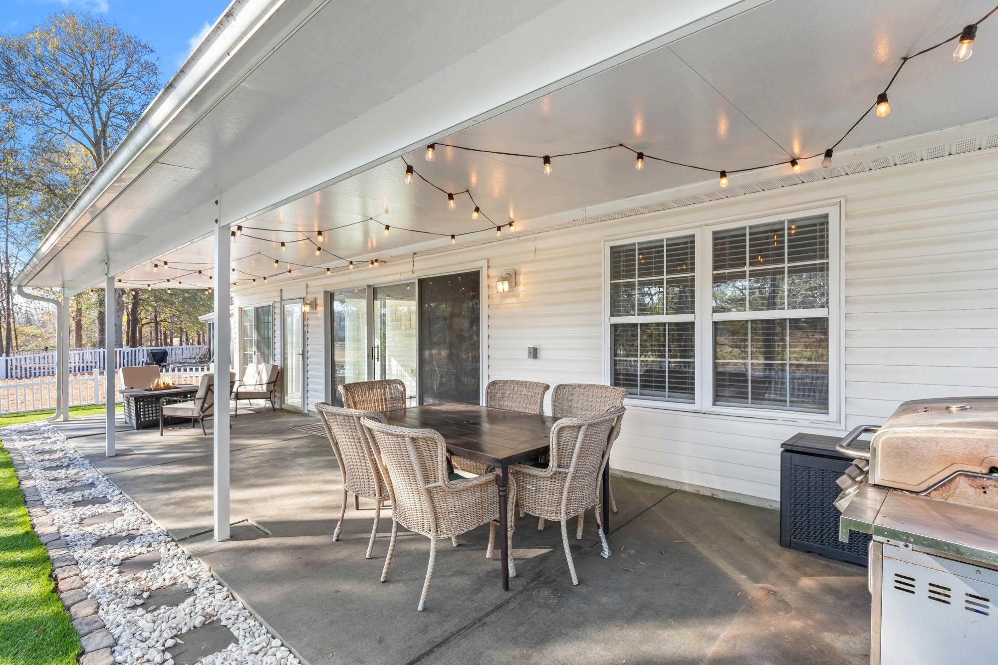 248 McKendree Lane Myrtle Beach, SC 29579 - Photo 22 of 34 View of patio featuring outdoor dining area and area for grilling