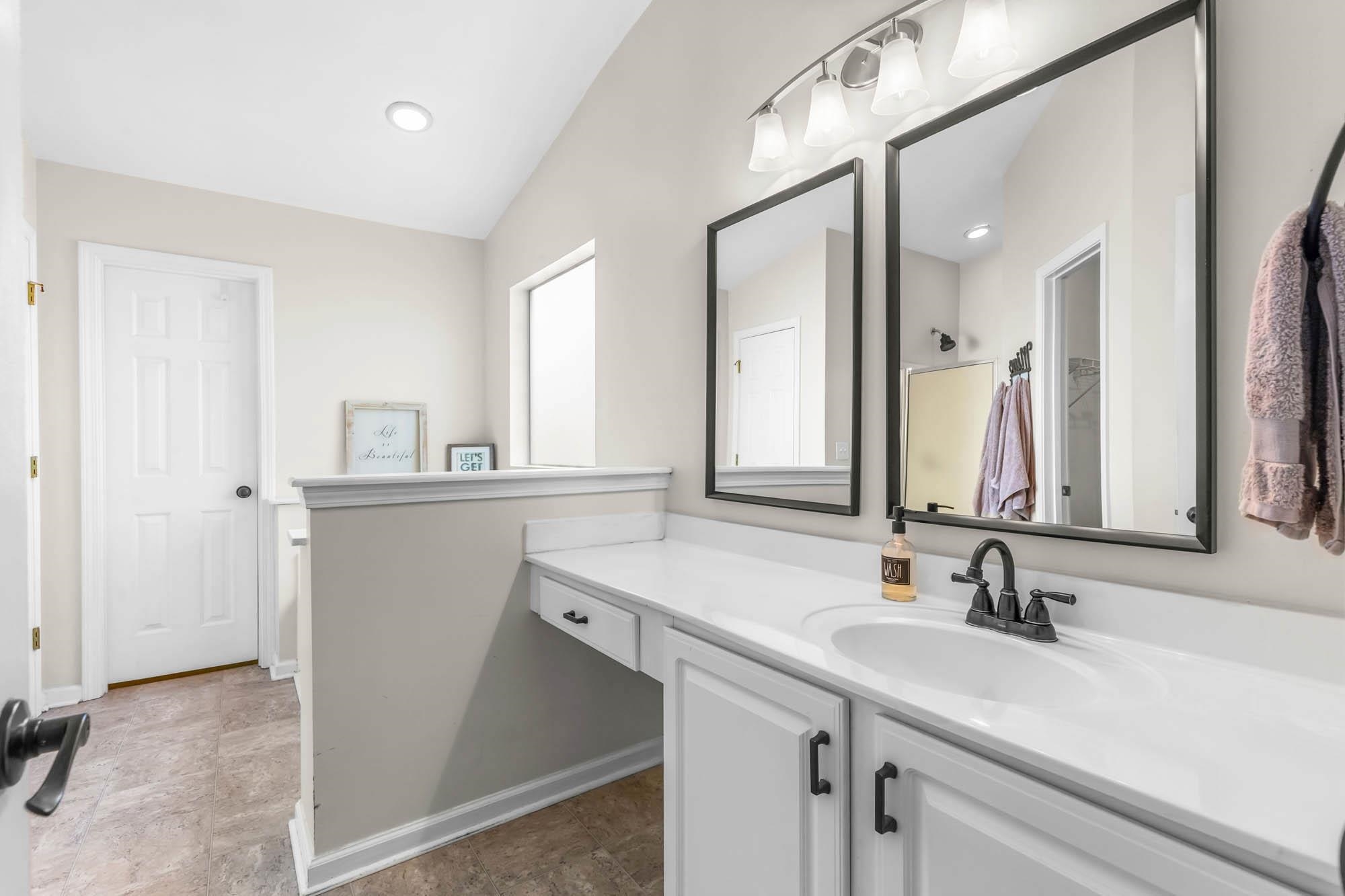 248 McKendree Lane Myrtle Beach, SC 29579 - Photo 27 of 34 Bathroom with vanity and lofted ceiling
