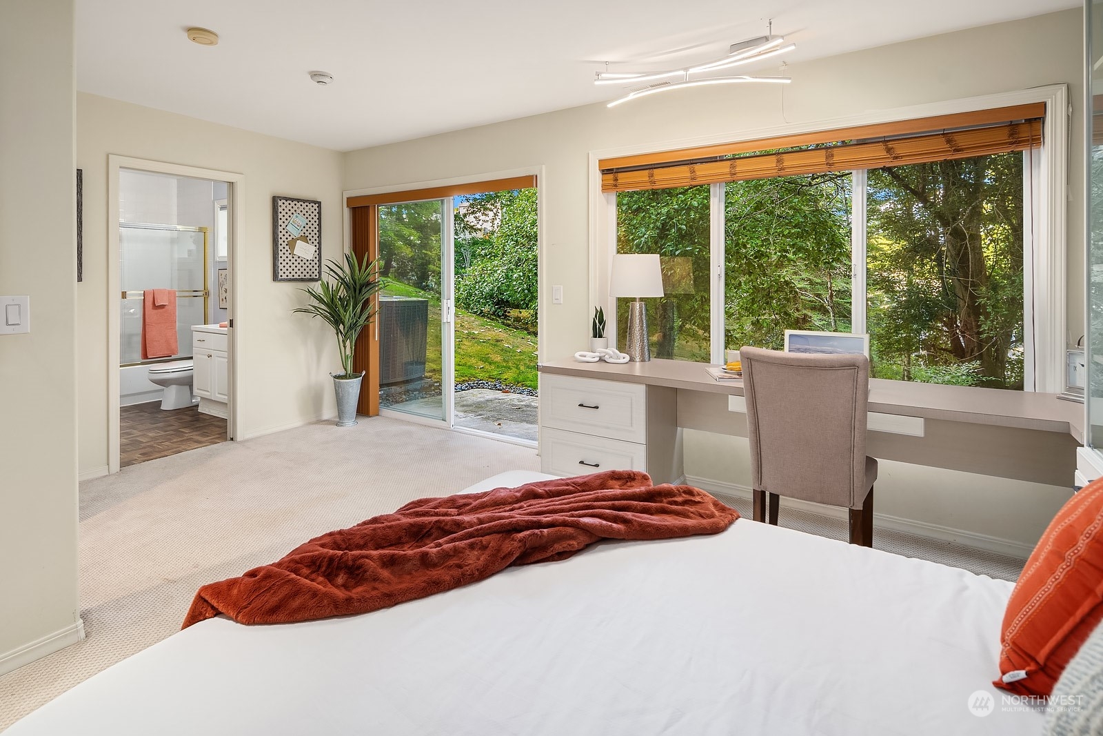 7323 Old Redmond Road, Unit 16 Redmond, WA 98052 - Photo 21 of 26 a bedroom with a large bed and a large window