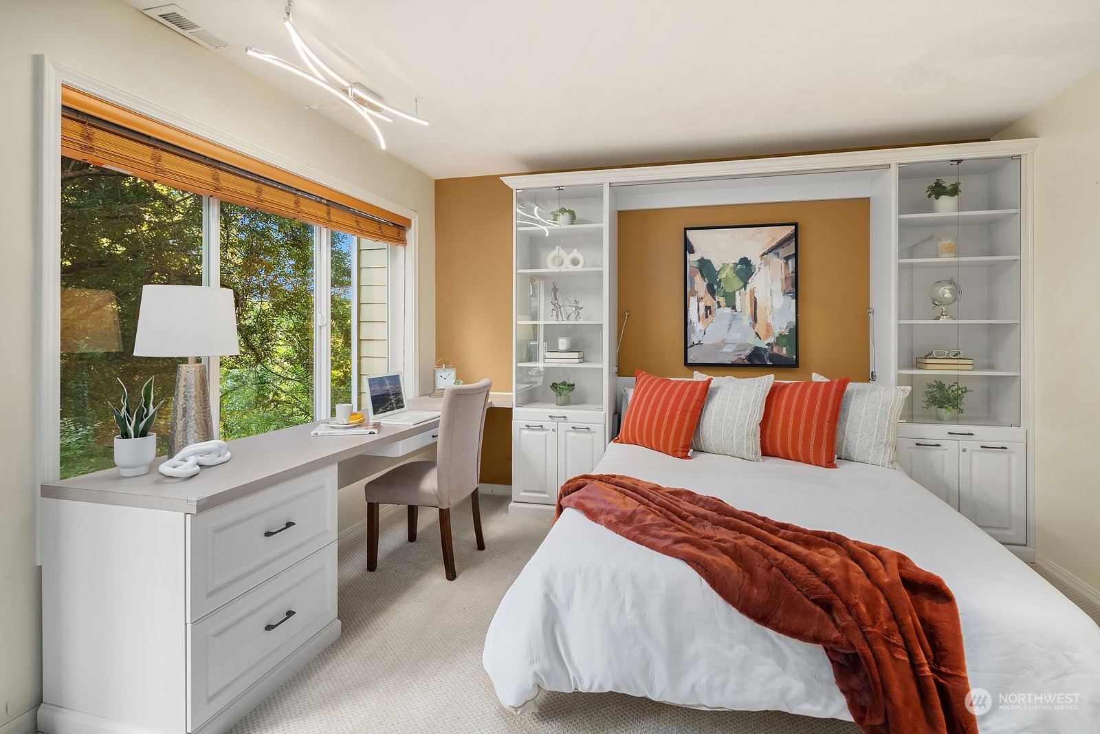 7323 Old Redmond Road, Unit 16 Redmond, WA 98052 - Photo 22 of 26 a bedroom with a large bed and a window