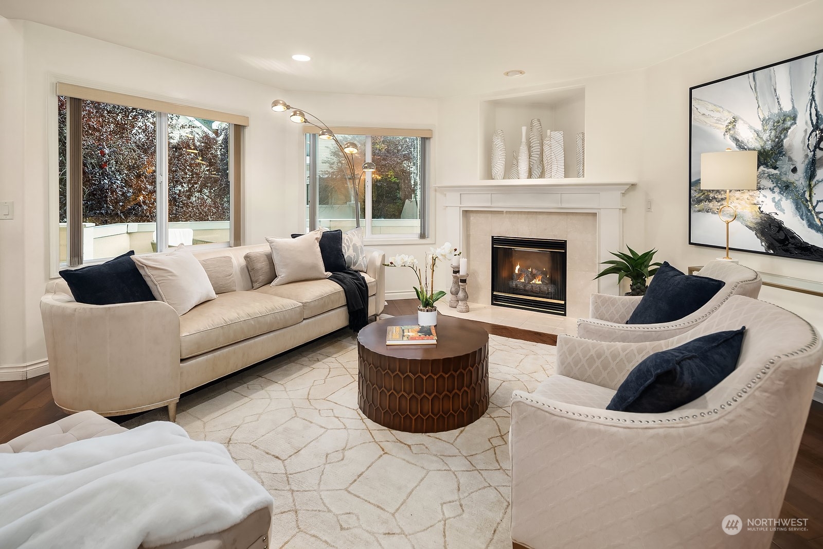 7323 Old Redmond Road, Unit 16 Redmond, WA 98052 - Photo 6 of 26 a living room with furniture a fireplace and a floor to ceiling window