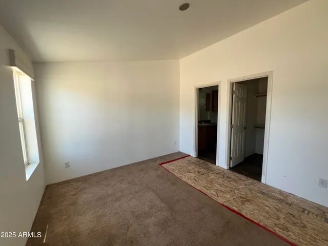 a view of small space with racks on the wall