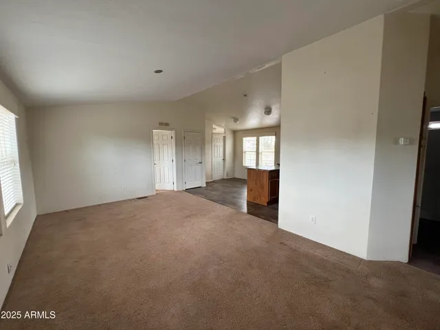 a view of an empty room and window