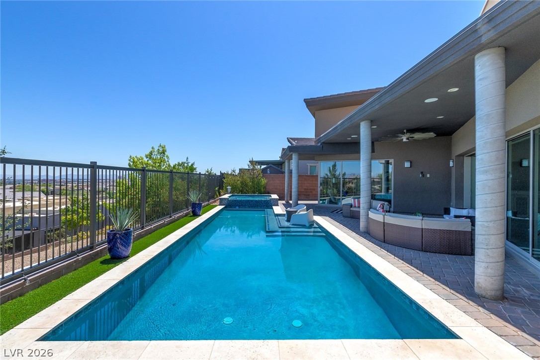 6014 Willow Ridge Court Las Vegas, NV 89135 - Photo 64 of 99 This outdoor oasis features a sleek pool, perfect for entertaining or quiet relaxation.
