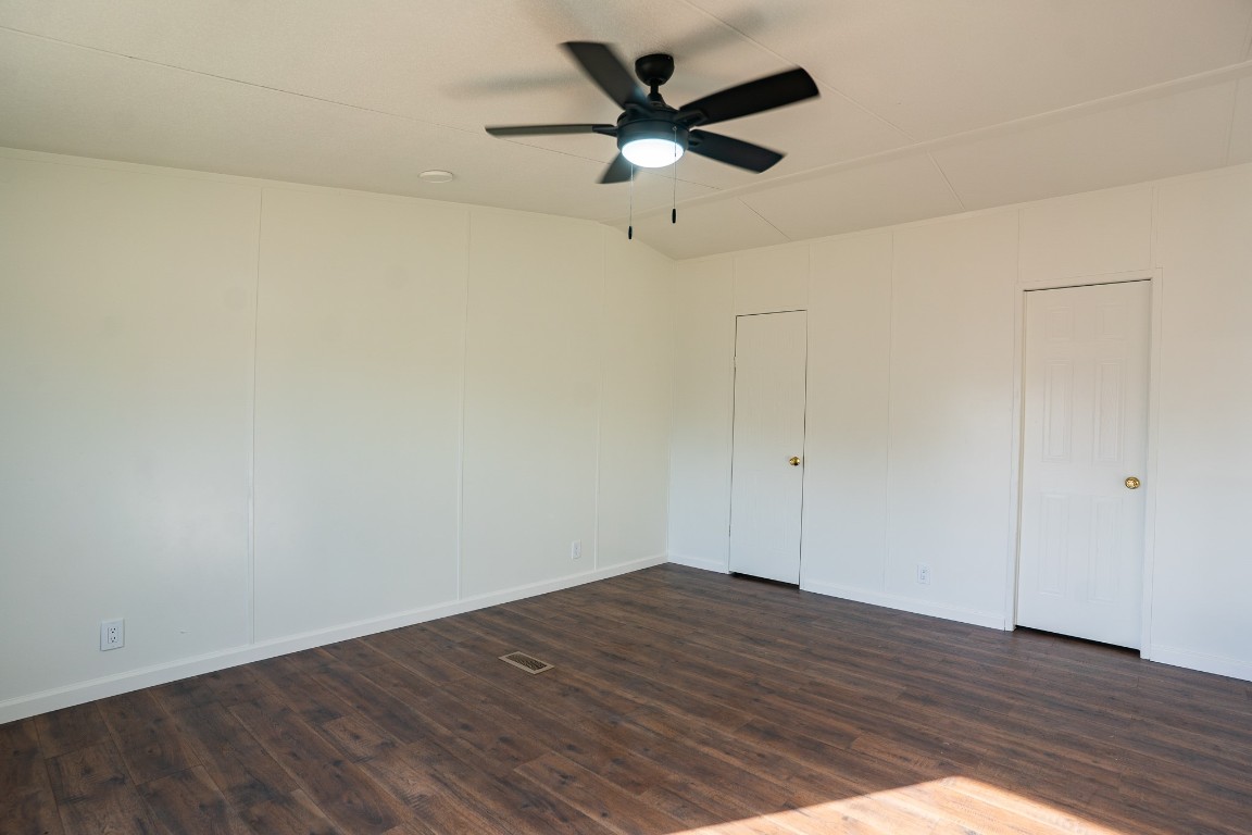 404 South Mill Street Flatonia, TX 78941 - Photo 23 of 34 a view of an empty room with wooden floor