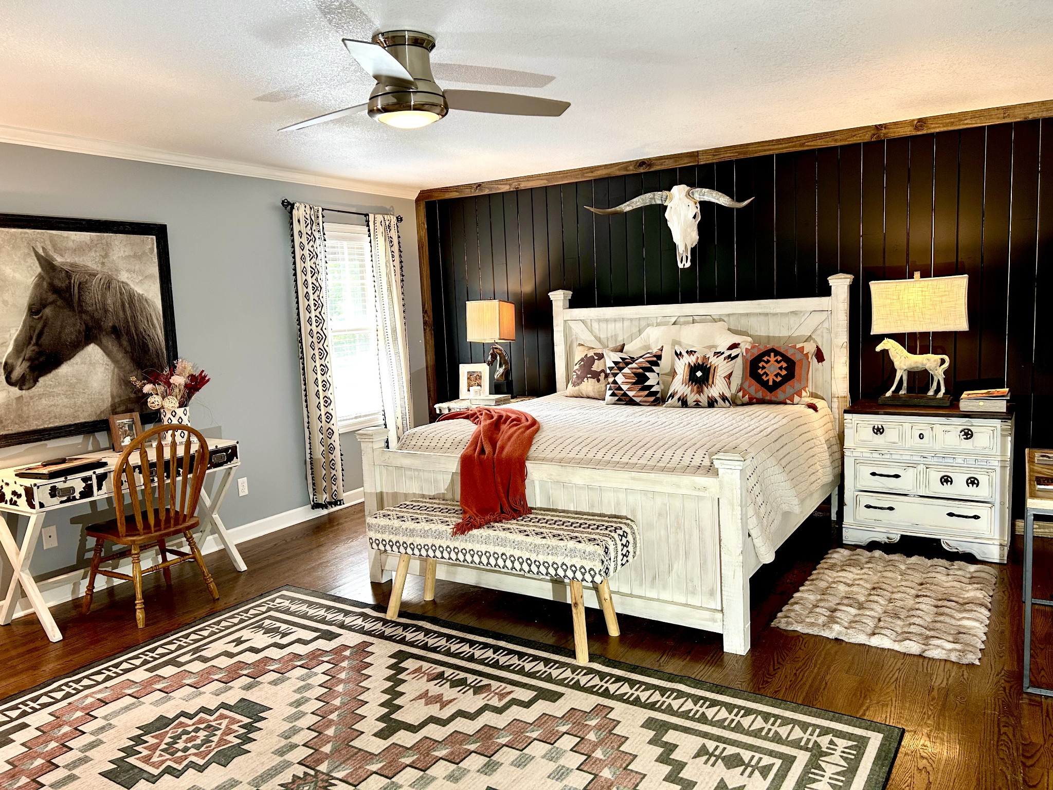 1198 Ed Sanders Road Lynchburg, TN 37352 - Photo 12 of 36 a bedroom with a bed and wooden floor