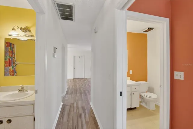 a bathroom with a sink and a toilet