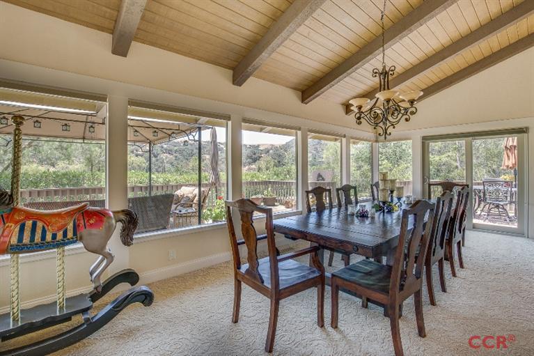 3125 Oxbow Place Solvang, CA 93463 - Photo 3 of 5 a dining room with furniture water view and a mountain view