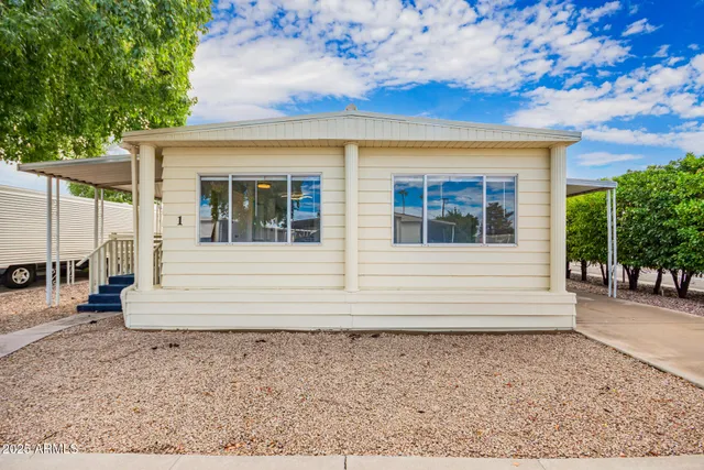 a view of a house with a garden