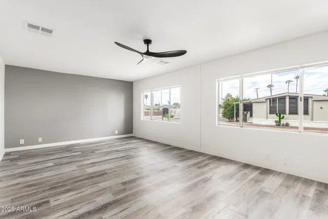 a view of an empty room with a window