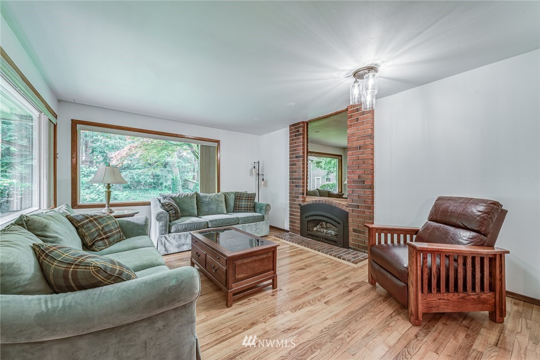20600 2nd Avenue Southwest Normandy Park, WA 98166 - Photo 11 of 40 a living room with furniture and a window
