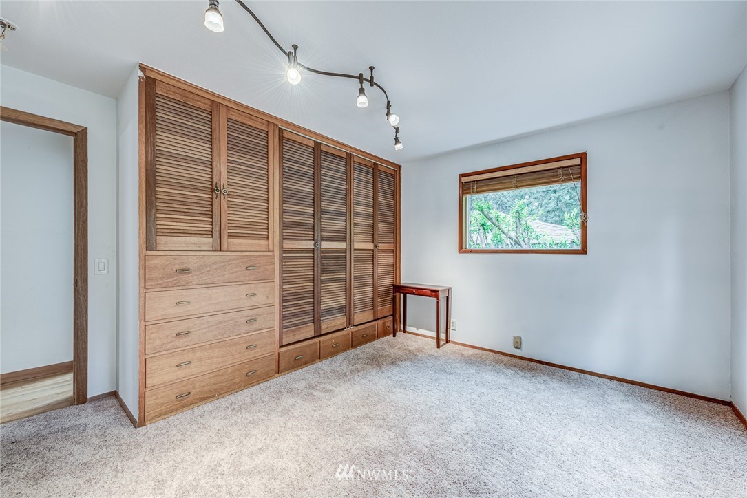 20600 2nd Avenue Southwest Normandy Park, WA 98166 - Photo 16 of 40 a view of an empty room with a closet