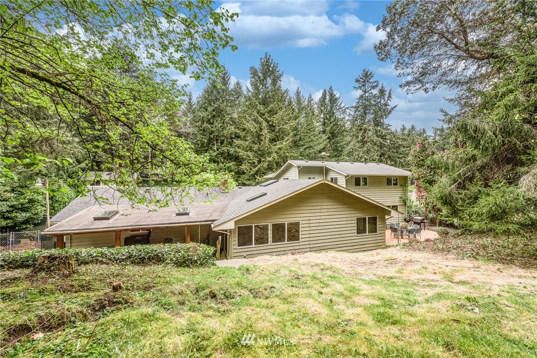 20600 2nd Avenue Southwest Normandy Park, WA 98166 - Photo 34 of 40 a house with trees in the background