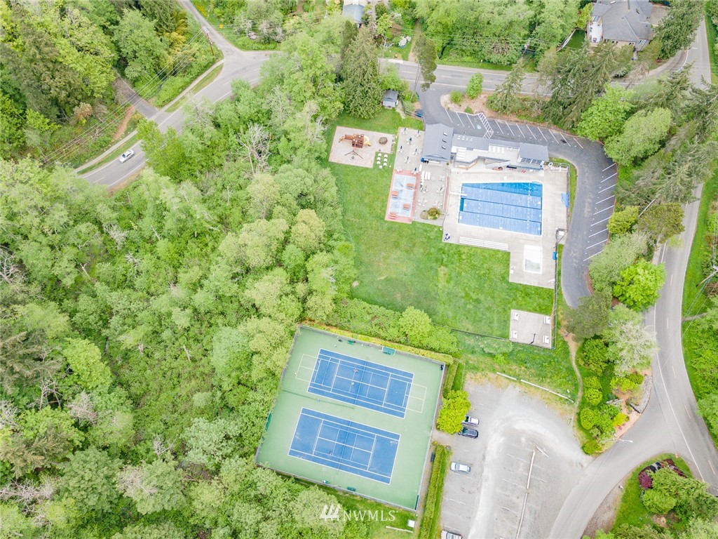 20600 2nd Avenue Southwest Normandy Park, WA 98166 - Photo 39 of 40 a sign that is sitting in front of a tree