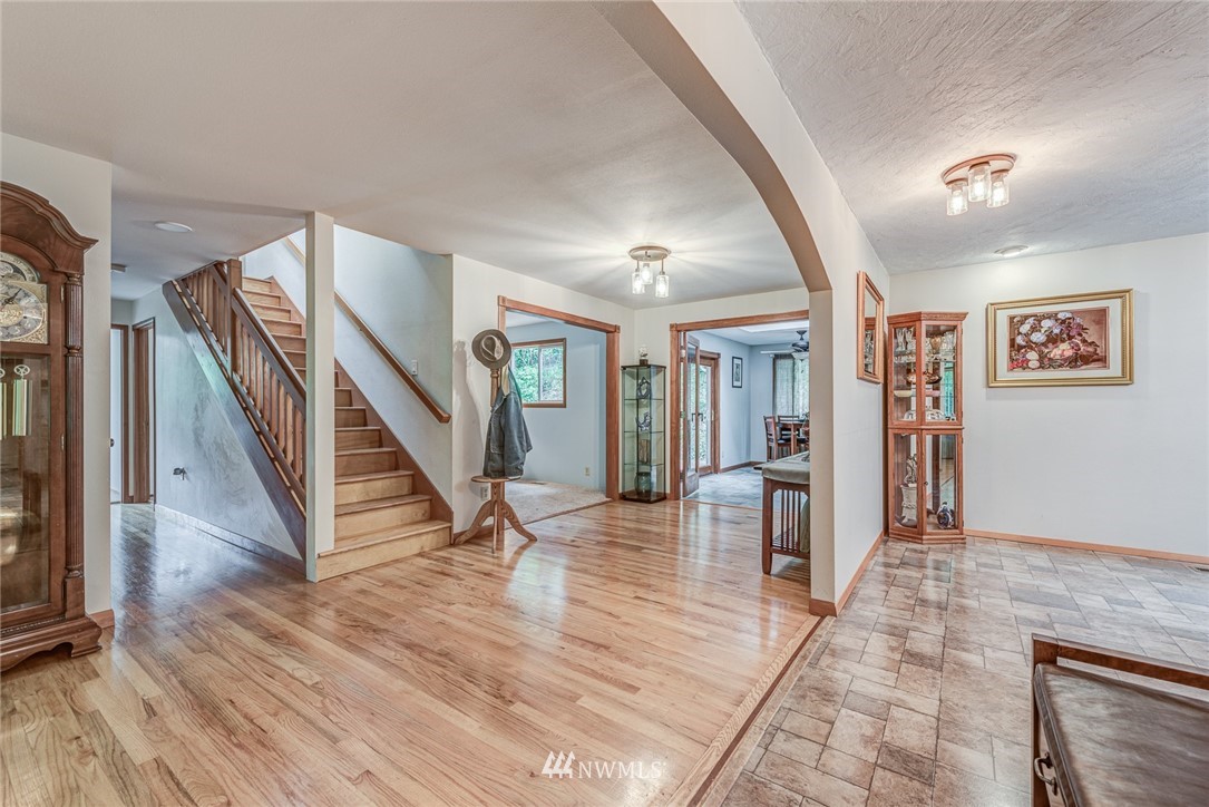20600 2nd Avenue Southwest Normandy Park, WA 98166 - Photo 6 of 40 a view of an entryway with wooden floor and staircase