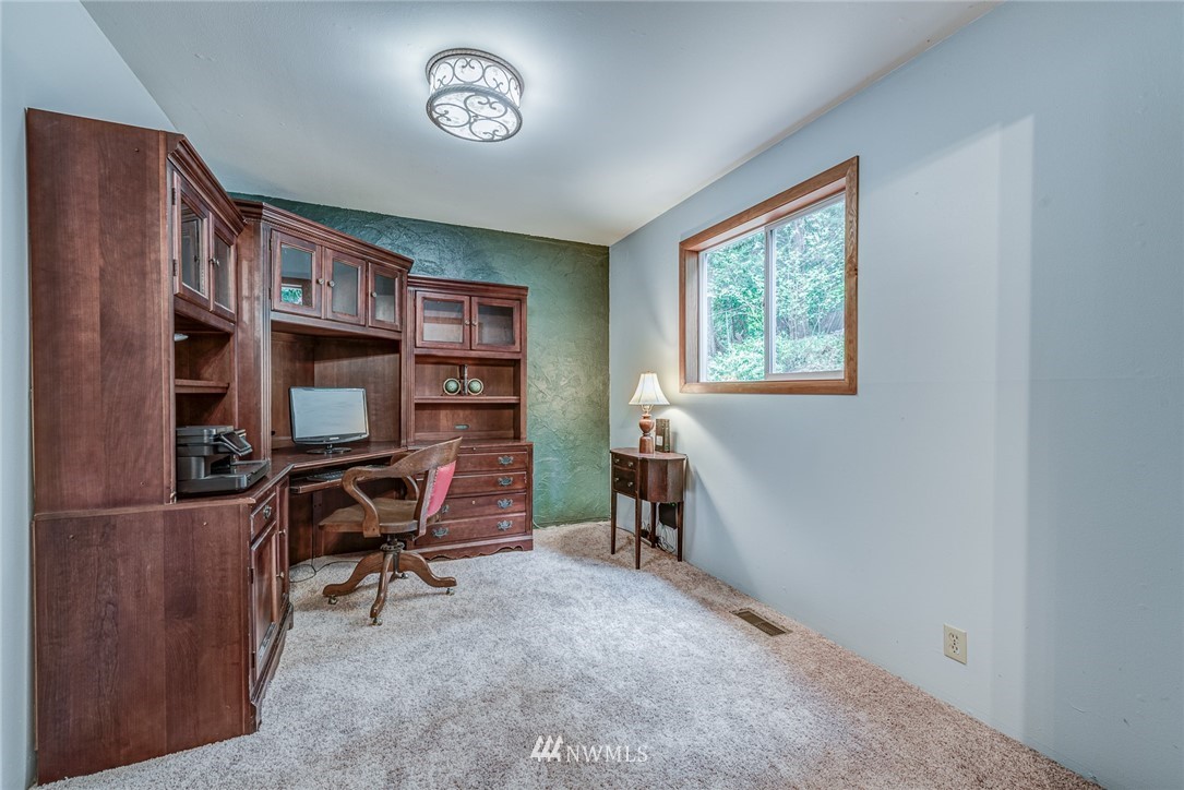 20600 2nd Avenue Southwest Normandy Park, WA 98166 - Photo 8 of 40 a view of a workspace with furniture and a window