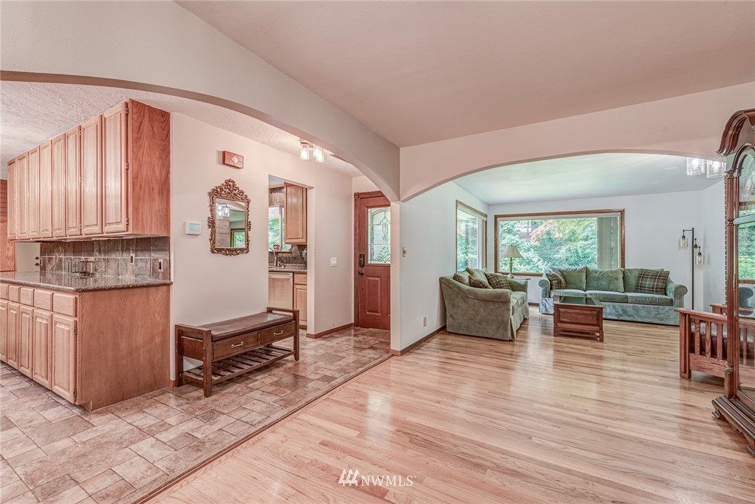 20600 2nd Avenue Southwest Normandy Park, WA 98166 - Photo 10 of 40 a living room with furniture a large window with wooden floor