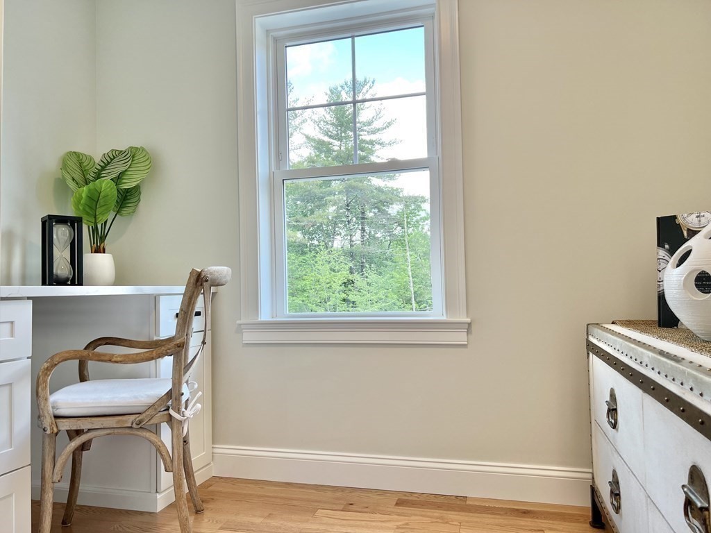 7 Sandy Pond Road Ayer, MA 01432 - Photo 13 of 22 a view of a workspace with furniture and a window