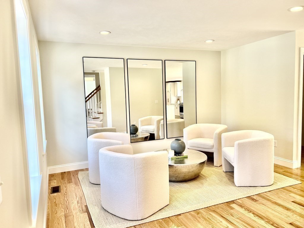 7 Sandy Pond Road Ayer, MA 01432 - Photo 4 of 22 a living room with furniture and a large window